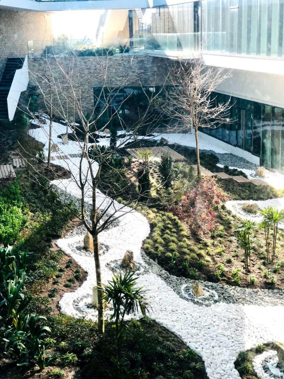 Royal Obidos Scenic Resort Praia del Rei Exterior foto The waterfall at the entrance of the building